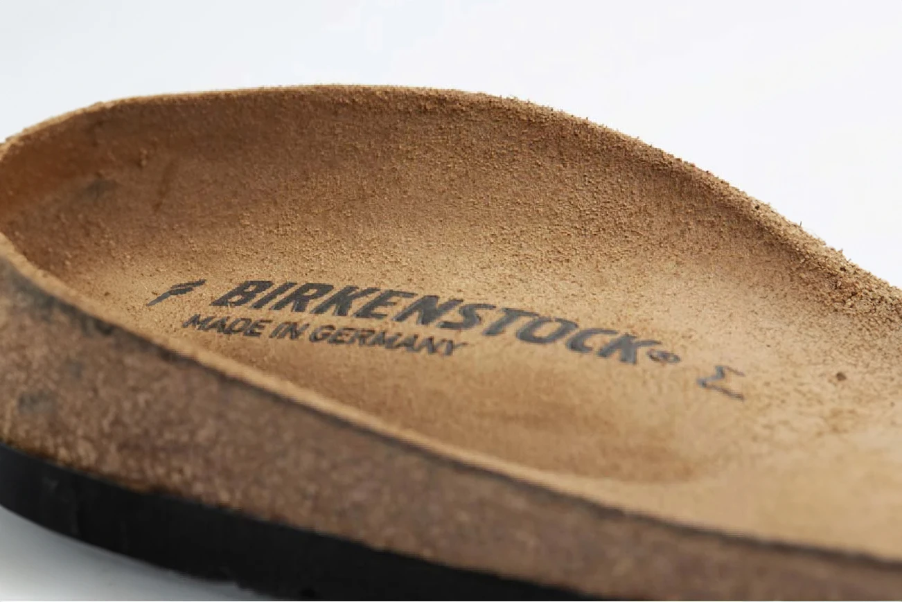 Illustration for the article "How to Care for Birkenstock Cork Footbeds, Leather and Suede: The Brand's Own Heat, Water and Cleaning Rules" from Simply Birkenstock