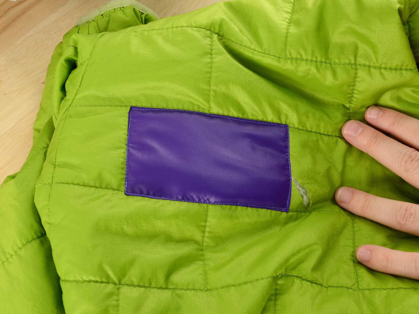 Illustration for the article "Patagonia Worn Wear: How the Trade-In, Repair and Recycling Program Works, as the Brand Describes It" from iFixit